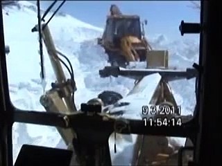 Motorgrader and Backhoe Loader Snow Plowing