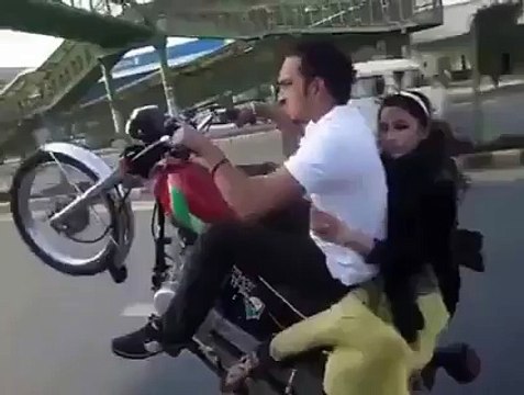 Boy one wheeling with his Girl Friend-Amazing Video
