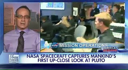 NASA celebrates mankinds first up-close look at Pluto