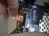 Open a PSP Slim and replace the UMD Drive ConsoleZombie.com