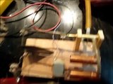 homemade steam engine generating electricity and powering led