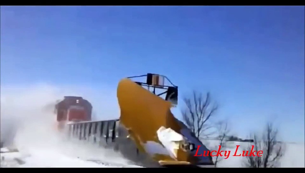 NEW 2013 Awesome Powerful Train plow through snow railway tracks Watch full HD
