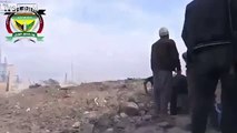 Syrian Army artillery scores a direct hit on FSA rebels.