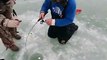 Milwaukee harbor ice fishing. Milwaukee harbor brown trout steelhead. Wisconsin fishing guide Kueng