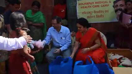 Kolhapur Medical Camp 2015 - Day 1 - Param Pujya Nandai Distributing Toys To Children