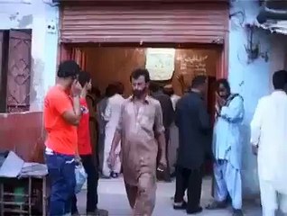Mirpur - Rush at shop selling vine bottles