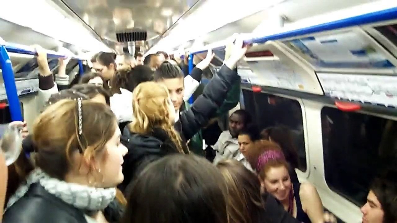 Flirty girls on the London tube during rush hour