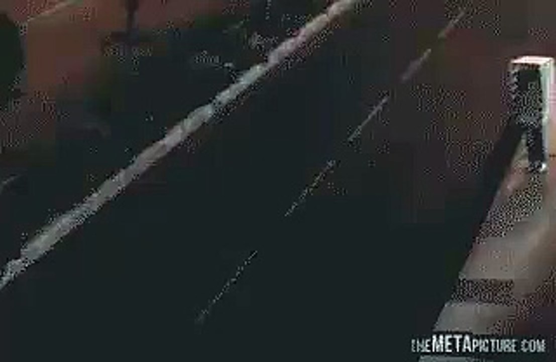 A person taking picture as showing he is machine