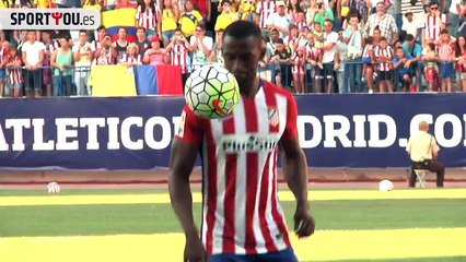 Fans invade the pitch to hug Jackson Martinez at Atletico Madrid presentation