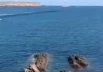 Bystander Catches Video of Fire-Plane Filling Up at Sea