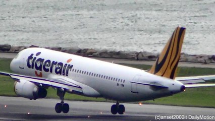 Airbus A320 TigerAir Landing in Hong Kong Airport. Flight TR2066 reg: 9V-TRM
