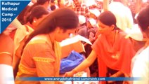 Kolhapur Medical Camp 2015 -Nandai distributing Uniforms & Study Materials to students - 2