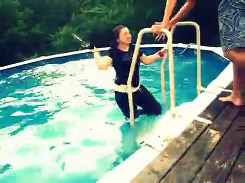 kid gets thrown into pool