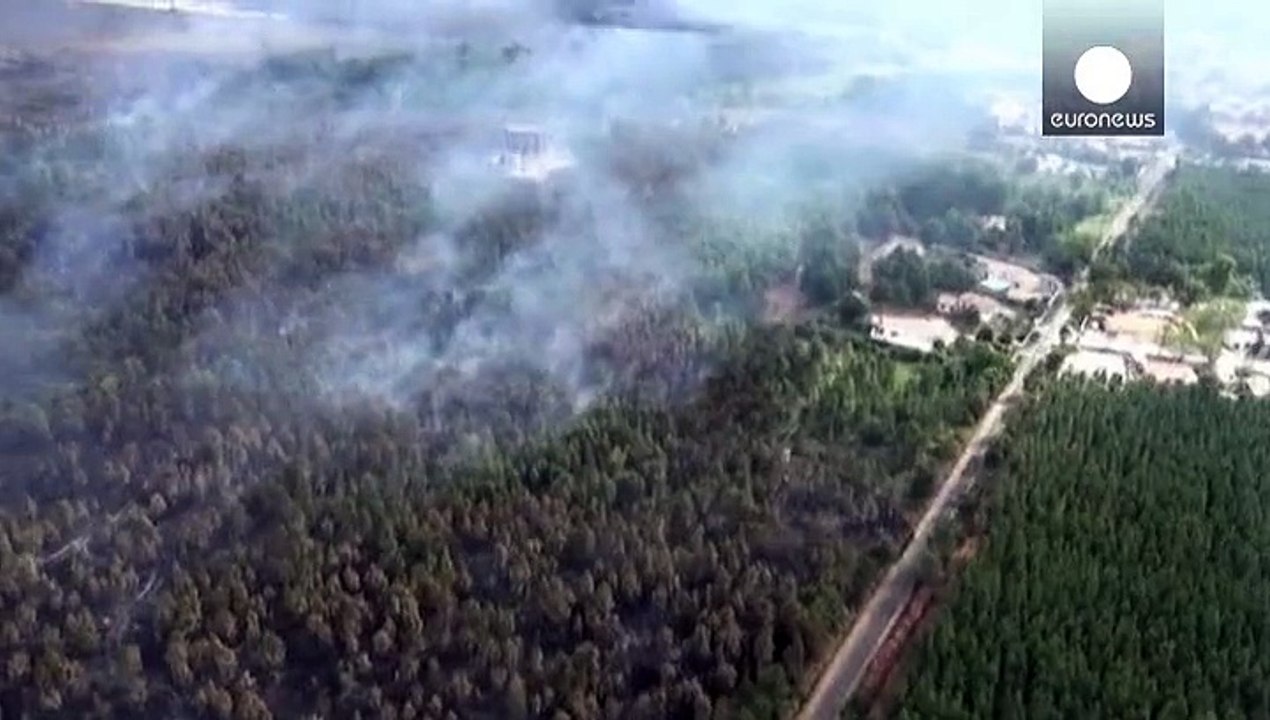 Fires: thousands in emergency shelters as huge blazes take hold in France and Spain