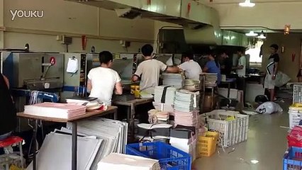 leather embossing machine - working in factory