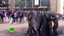 Video: Violent clashes as 100,000-student protest turns ugly in Chile