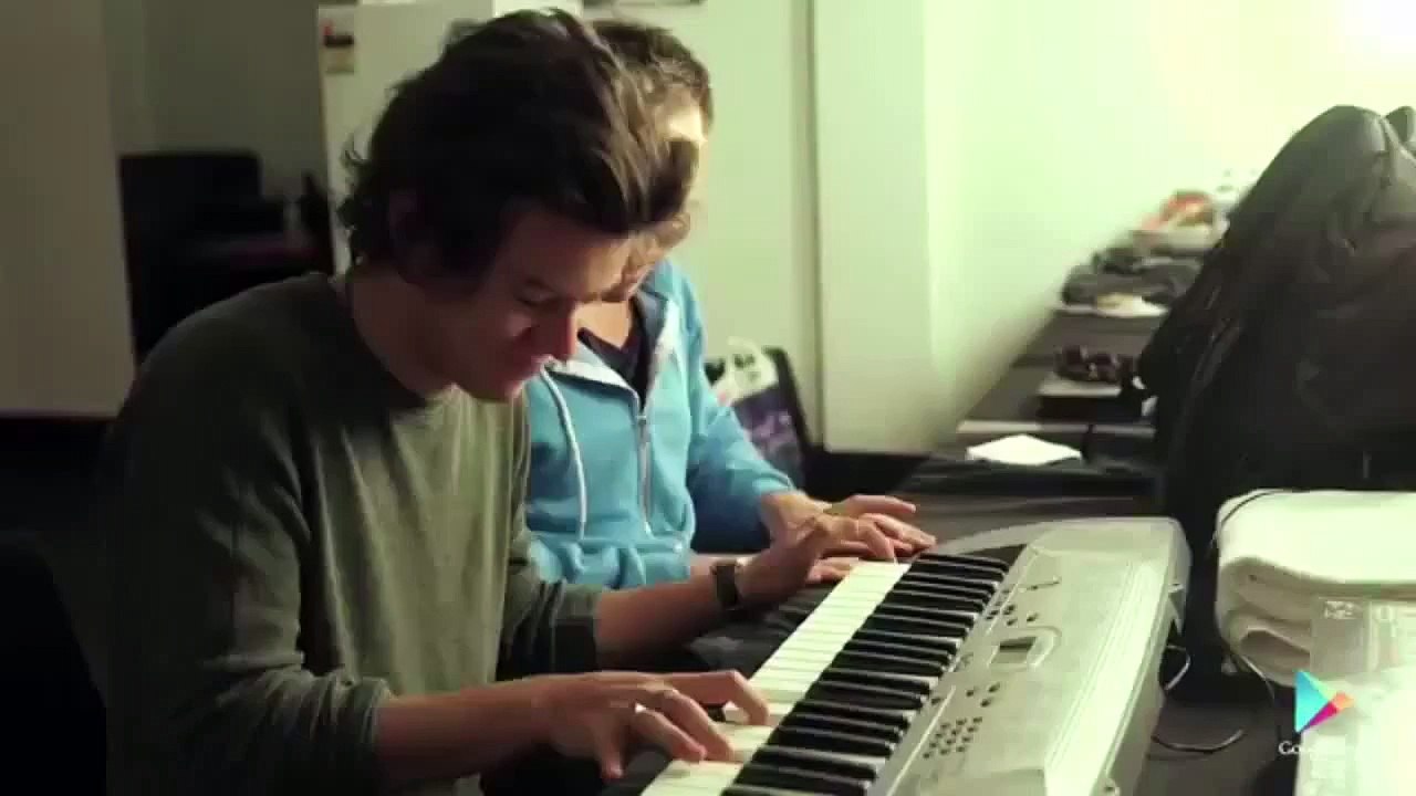 Harry Styles playing the piano