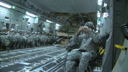 US Army C-17 cargo plane drops 4 Humvee by night