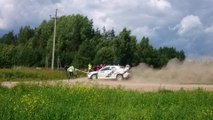 Rally car crashes, barely misses cameraman