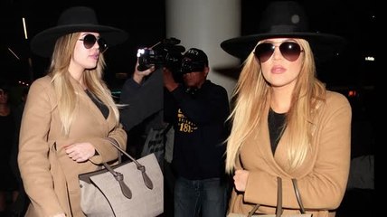 Khloé bedeckt am LAX, nach dem freizügigen Complex Fotoshooting