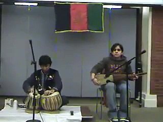 Afghan Girl playing Rabab nicely.flv
