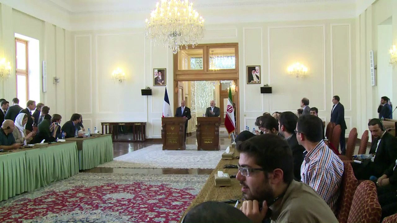 France seeks to warm up Iran ties with Rouhani invite