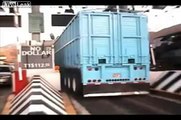 Big truck loses control and sweeps away everything in its path