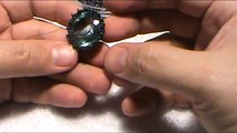 How to bead a bezel for a faceted stone that looks like a real gem setting.
