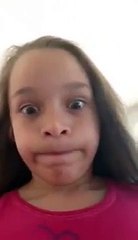 Little girl trying not to sneeze