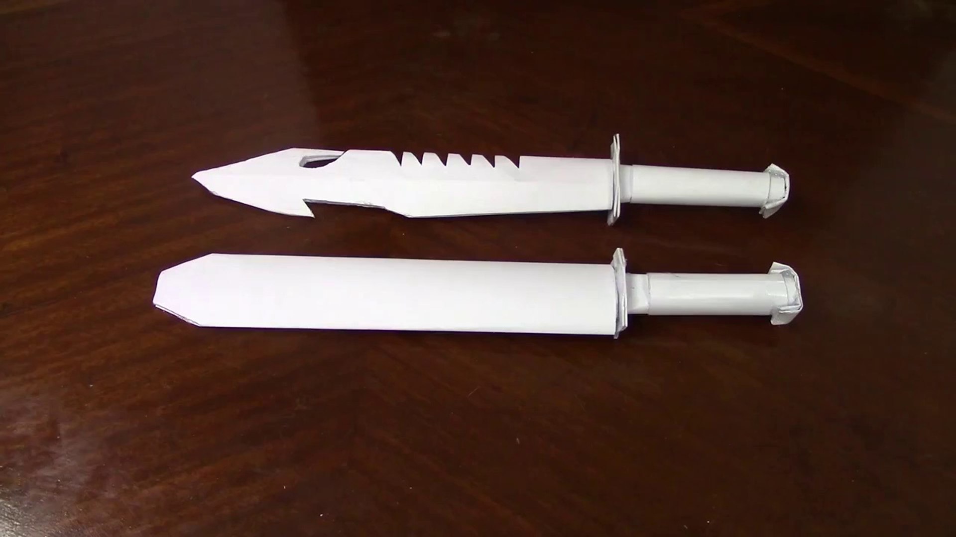 How to make a paper combat knife that cuts - paper weapons - video ...