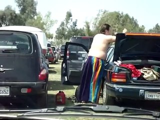 Fat Guy Getting Dressed Outside Coachella