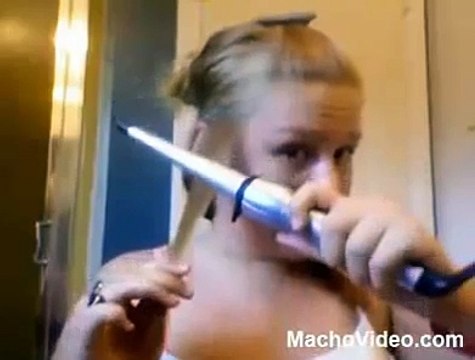 Girl Burns Her Hair with Curling Iron...