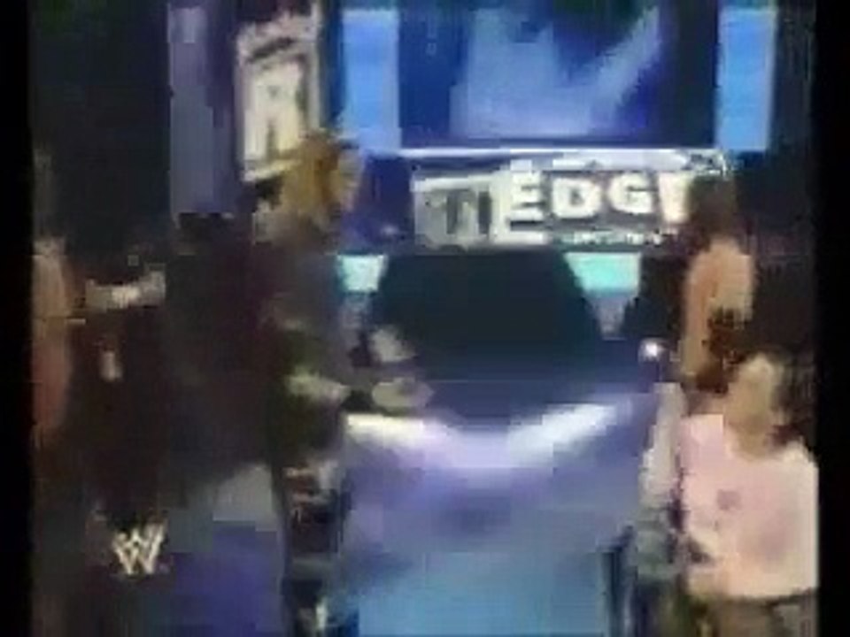 The undertaker vs Vickie Guerreo with la familia; the family