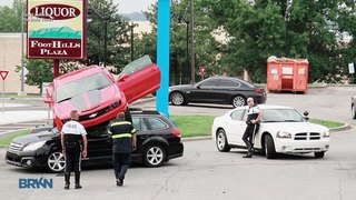 Camaro Lands On Subaru In Crazy Accident