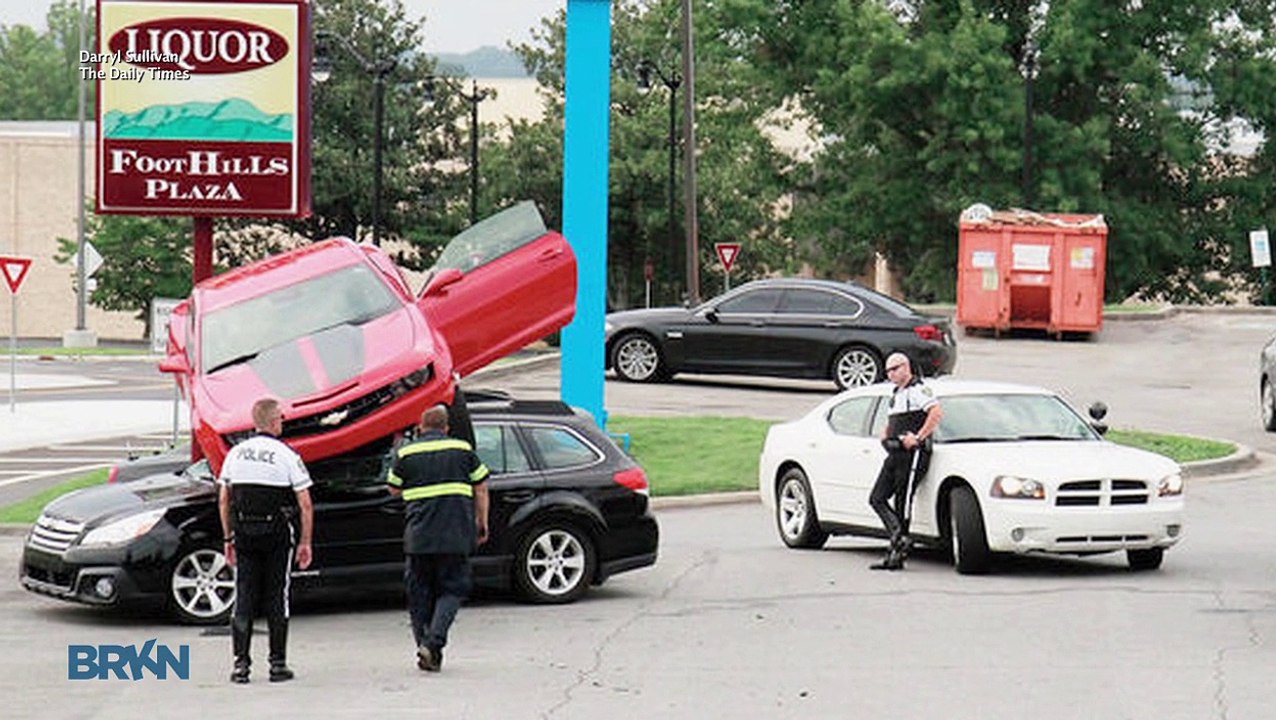 Camaro Lands On Subaru In Crazy Accident