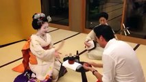 Drinking games  with a Geisha in Japan