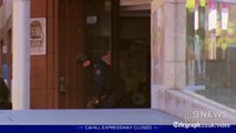 Women hostages flee Sydney siege café