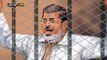 مشهد تمثيلي لما دار اليوم في محاكمة الرئيس مرسي قناة الجزيرة 28-1-2014