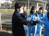 Giving autographs to school kids in Japan