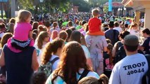 100 Years of Girl Scouting GSUSA - Scouts exchange swaps at EPCOT