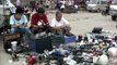 Men selling mobile phones at a second hand market in China. Stock Footage