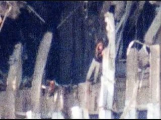 Woman in the WTC hole inferno (never seen before photos)