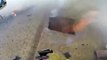 Body-Cam Video- Firefighters fighting a blaze on a roof