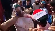 KPK People beating Nawaz Sharif's effigy with Shoes