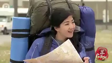 two travelers having prank with people