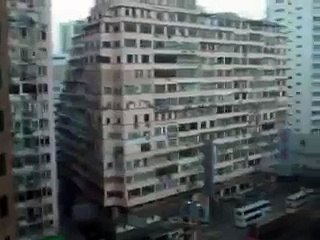 Eaton Hotel, Kowloon Hong Kong.  Going down the glass elevator.