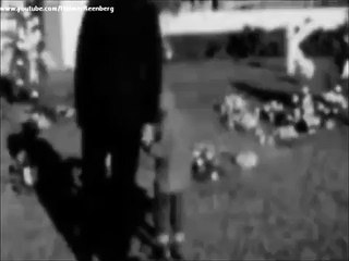November 25, 1963 - Roman Catholic nuns kneel and pray in Dealey Plaza, Dallas, Texas