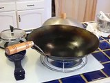 Scrambling eggs in a wok