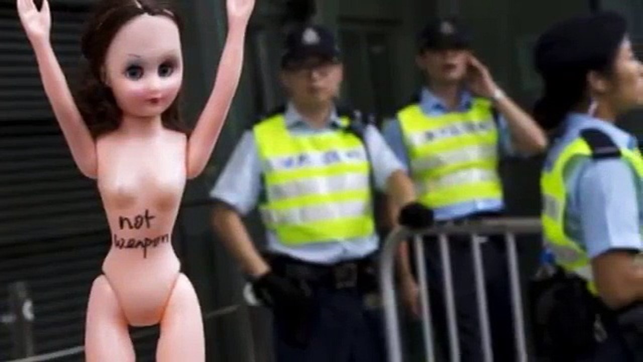 Hong Kong protest over 'breast as weapon' conviction