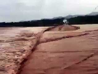 Imran Khan reply after crossing fast flowing flood water